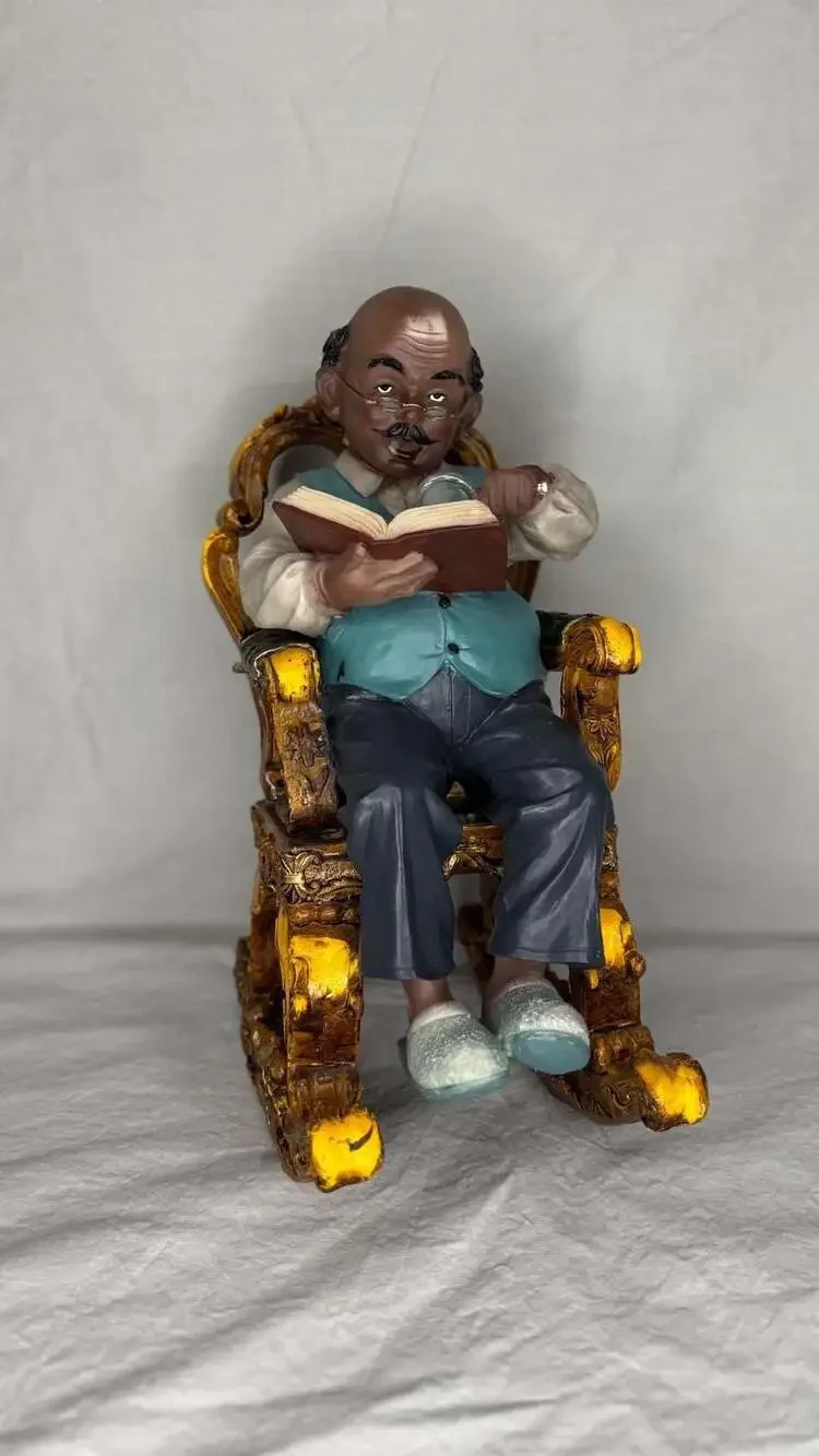 Vintage American Elderly Grandfather Reading a Book in Rocking Chair Figurine